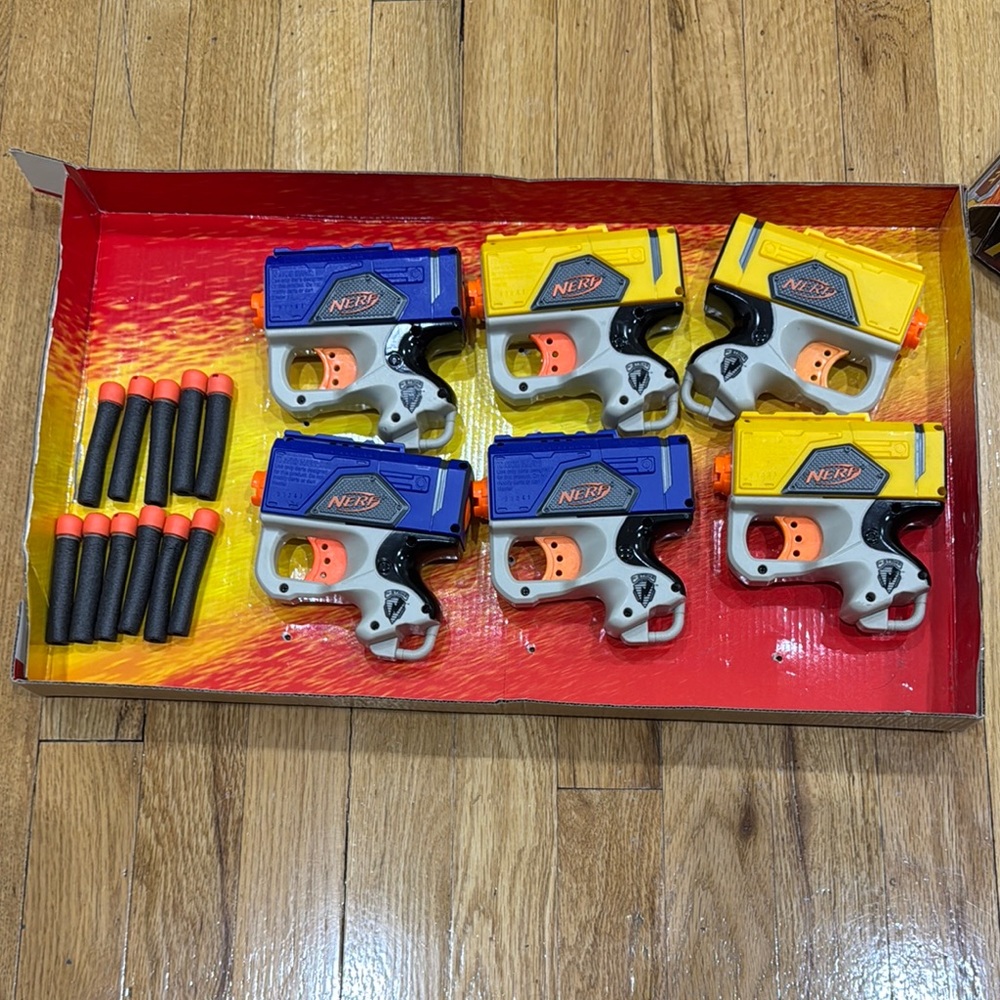 NERF N-Strike Blasters and 11 darts